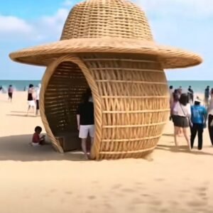 Rattan Round Sofa Bed with Sunshade Design, Cozy Daybed for Patio, Terrace, Swimming Pool, and Backyard Use.